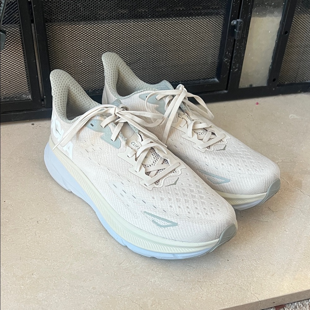 SOLD  Hoka Clifton 9 Shoes cream and a greenish grey color size 12 2E